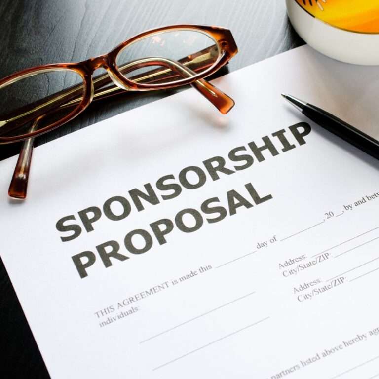 Sponsorship proposal document with glasses and pen illustrating change management sponsorship.