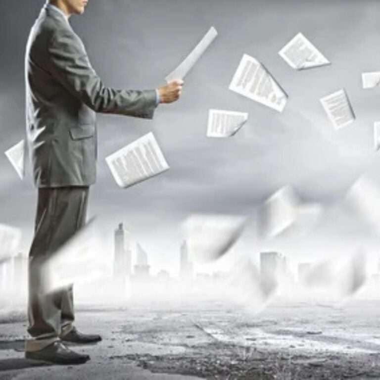 Man in suit amidst swirling documents representing transformational change and sponsor contracting for implementation management.